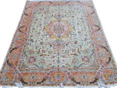 A very fine Persian handmade Tabriz rug highlighted in silk. 200 x 153 cm.