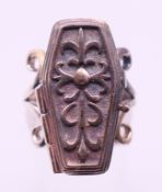 A silver coffin ring. Coffin 2.25 cm high.