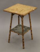 A bamboo side table. 41.5 cm wide.