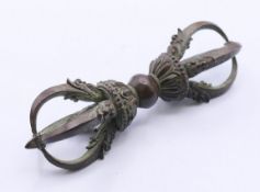 A bronze vajra. 11.5 cm long.
