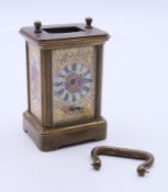 A miniature carriage clock. 6.5 cm high.
