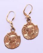 A pair of 9 ct gold Art Nouveau earrings. 2 cm high. 7.3 grammes.