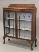 An early 20th century mahogany display cabinet. 106 cm wide.