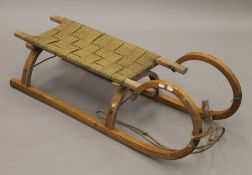 A traditional Norwegian sledge. 104 cm long.