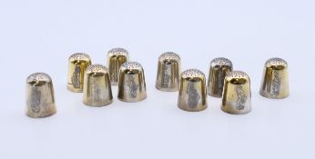 Ten silver thimbles. Each approximately 2.25 cm high. 73.3 grammes.
