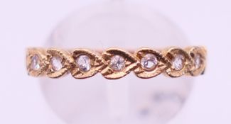 A 9 ct gold dress ring. Ring size R.