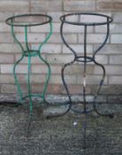 Two Victorian wrought iron stands. The largest 74 cm high.