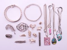 A quantity of silver jewellery, to include pendant necklaces, brooches, bracelets,