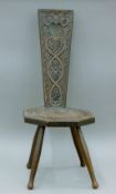 A Victorian carved spinner's chair. 86 cm high.