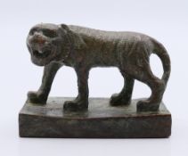 A bronze tiger seal. 5.5 cm long.