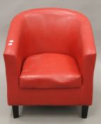 A modern red tub chair. 65 cm wide.