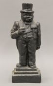 A cast iron doorstop formed as Winston Churchill. 37 cm high.