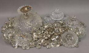 A glass chandelier. 24 cm wide.