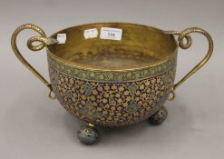 An antique Kashmiri gilt bronze and enamel bowl. 32.5 cm wide.