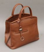 A Casa Lopez leather handbag. 33 cm wide.