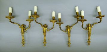 A quantity of wall light fittings. The largest 30 cm wide.