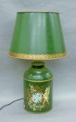A green toleware lamp with shade. 71 cm high.
