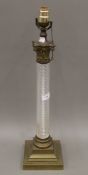A brass-mounted glass spiral column lamp. 59 cm high.