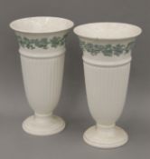 A pair or Wedgwood porcelain vases. Each 28 cm high.