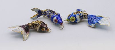 Three Chinese articulated fish. Largest 8.5 cm long.