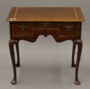 A George III mahogany low boy. 75 cm wide.