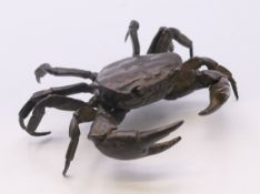 A bronze articulated crab. 10 cm wide.