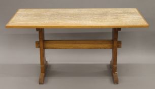 An oak refectory table and four kitchen chairs. The former 151 x 76 cm.