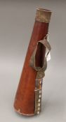 A Kenyan Maasai tribe milk gourd with leather carrying handle and bead decoration. 48 cm high.