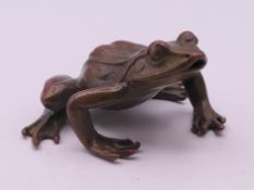 A bronze frog. 5.5 cm wide.