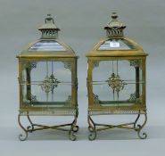 A pair of lanterns. Each 56 cm high.