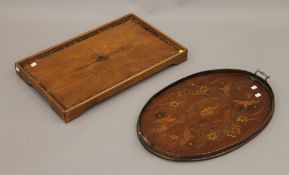 A Victorian inlaid mahogany tray and a folding bed tray. The former 66 cm wide.
