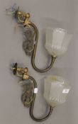 A pair of brass wall light fittings. Each 22 cm high.