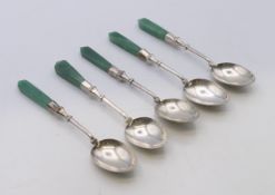 Five unmarked silver and jade spoons. Each 12.25 cm long.