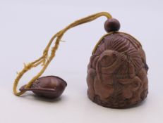 An inro decorated with rabbits. 6 cm high.