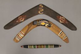 Two Aboriginal boomerangs and an Aboriginal digging stick. The latter 29.5 cm long.