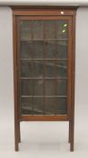 An Edwardian mahogany display cabinet. 71 cm wide x 152.5 cm high.