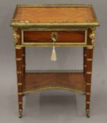An 19th century-style ormolu-mounted French side table. 59.5 cm wide.
