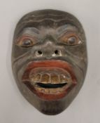 A vintage traditional Javanese (Indonesia) Wayang Topeng hand carved and painted wood mask.