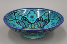An Iznik pottery dish. 26 cm diameter.