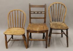 Two stick back chairs and a 19th century elm seated bar and ball-back chair. The latter 41.