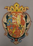 An 18th/19th century embroidered heraldic crest/coat-of-arms. 28.5 cm high.