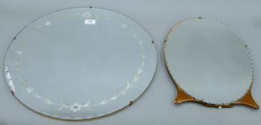 An Art Deco wall mirror and an Art Deco strut mirror. The former 50.5 cm diameter.