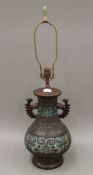 A Japanese bronze and cloisonne lamp. 46 cm high excluding fitting.