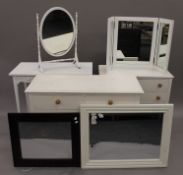 Two white painted chests of drawers, a white painted three-drawer dressing table,