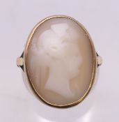 A 9 ct gold cameo ring. Ring size M/N. 5.2 grammes total weight.