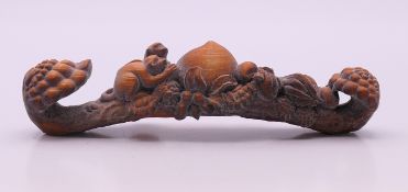 A carving of a ruyi sceptre. 10 cm long.