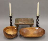 A pair of oak barley twist candlesticks, two treen bowls and a pine stool. The latter 30 cm long.