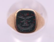 A 9 ct gold signet ring. Ring size I/J. 2.3 grammes total weight.