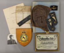 A World War II POW photograph album together with a quantity of RAF memorabilia relating to Sgt