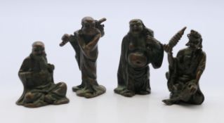 A Chinese set of four bronze figures. The tallest 5.5 cm high.